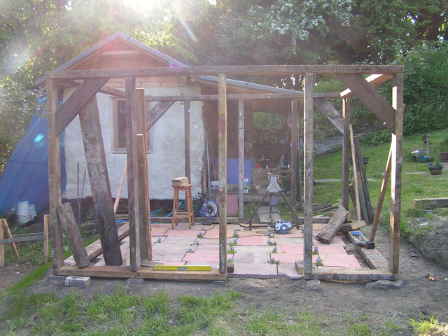 the view through the two doors to the house