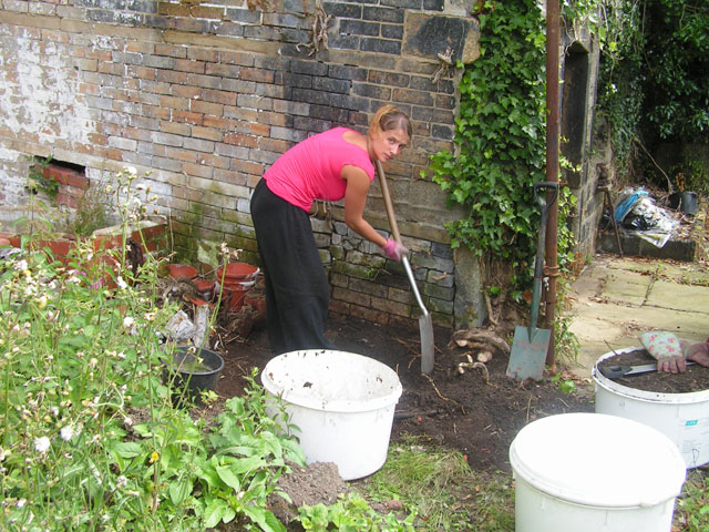 Elodie doing some shovelling on her last day