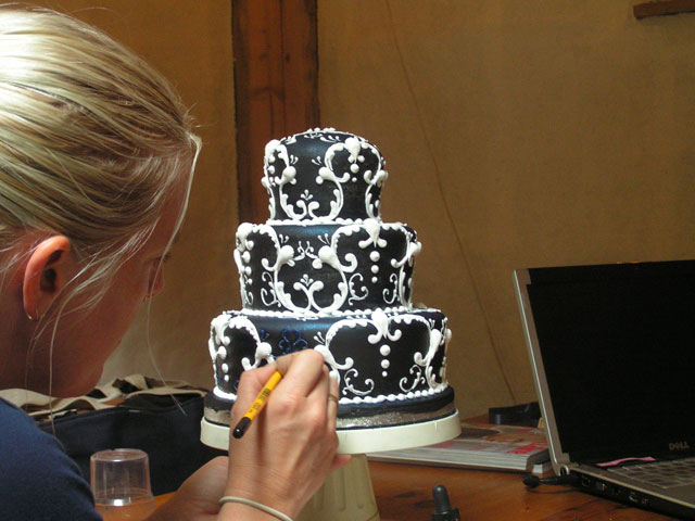 Abi's cake being painted