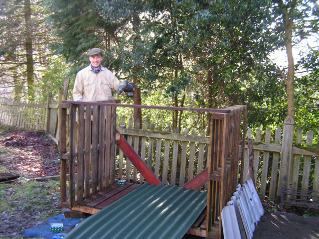 Achim building a woodshed